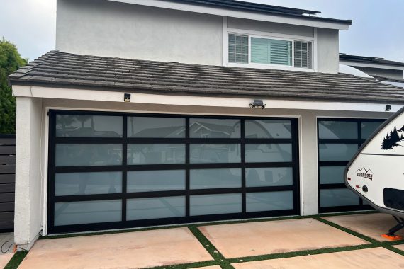 Modern glass garage door with sleek aluminum frame